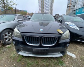 бампер BMW X1 2010