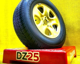 Колесо на диске Suzuki 5x114.3 c шиной Bridgestone 225/70R16